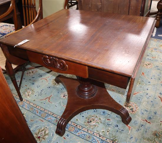 A 19th century North European mahogany drop flap centre table on pillar and platform base W.88cm